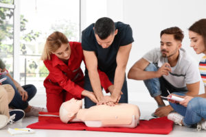 cpr-on-mannequin-with-instructor